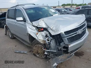 2016 Chevrolet Tahoe LS z VIN 1GNSCAEC2GR392937, wystawiony jako IAAI lot #42648714 z przebiegiem 166 764 mil mil oraz . Historia ofert i sprzedaży dostępna na DreamBid. Obrazek 1.