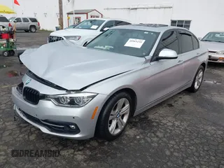 2016 BMW 3 Series 328i xDrive with VIN WBA8E3G56GNU04938, listed as a IAAI auction lot 40965235 with 63,863 mi miles. Bid and sale history available at carsss.com. Image 2.