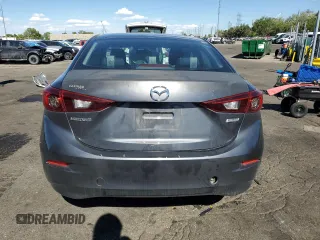 2015 Mazda 3 i Sport z VIN 3MZBM1U70FM215164, wystawiony jako Copart lot #57527785 z przebiegiem 144 621 mil mil oraz Szkoda całkowita • Salvage title. Historia ofert i sprzedaży dostępna na DreamBid. Obrazek 6.