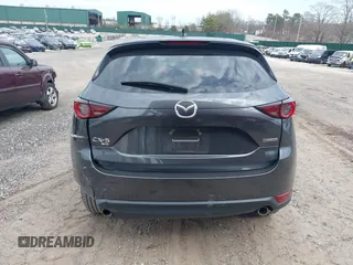 2021 Mazda CX-5 Touring with VIN JM3KFBCM8M0492145, listed as a IAAI auction lot 39077248 with 20,408 mi miles. Bid and sale history available at carsss.com. Image 16.