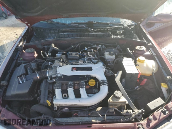 2002 Saturn LS z VIN 1G8JW54R22Y575062, wystawiony jako Copart lot #42009225 z przebiegiem Nie podano mil oraz Nie do naprawy. Historia ofert i sprzedaży dostępna na DreamBid. Obrazek 11.