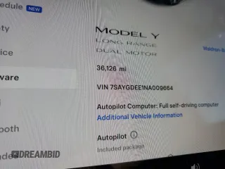 2022 Tesla Model Y Long Range z VIN 7SAYGDEE1NA009664, wystawiony jako Copart lot #41533925 z przebiegiem 36 126 mil mil oraz Szkody całkowita. Historia ofert i sprzedaży dostępna na DreamBid. Obrazek 9.