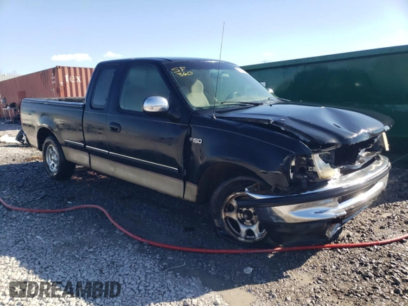 1997 Ford F-150 with VIN 1FTDX1722VNB96527, listed as a Copart auction lot 87304814 with 106,771 mi miles and Salvage title. Bid and sale history available at DreamBid. Image 4.