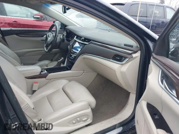 2013 Cadillac XTS Luxury with VIN 2G61P5S3XD9196239, listed as a IAAI auction lot 41205081 with 161,885 mi miles and . Bid and sale history available at carsss.com. Image 5.