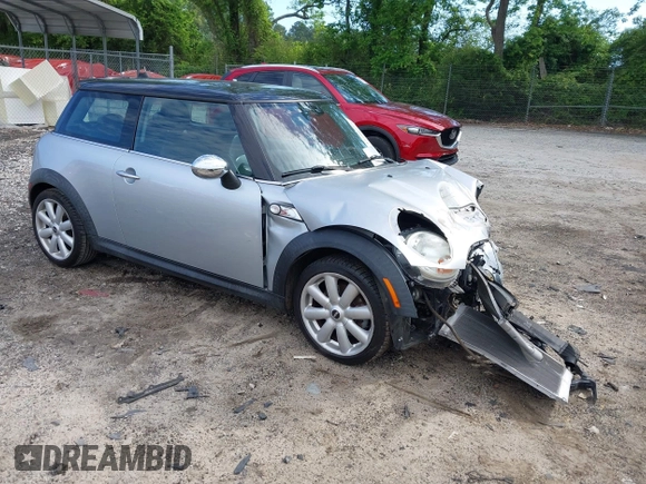 2007 MINI Hardtop S with VIN WMWMF73537TL88038, listed as a IAAI auction lot 42200252 with 70,603 mi miles and . Bid and sale history available at DreamBid. Image 1.