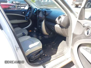 2014 MINI Countryman with VIN WMWZB3C52EWR42241, listed as a IAAI auction lot 41734963 with 121,325 mi miles and . Bid and sale history available at DreamBid. Image 5.