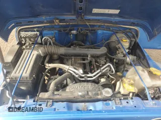 2003 Jeep Wrangler Sport z VIN 1J4FA49S53P350281, wystawiony jako Copart lot #56634005 z przebiegiem 158 974 mil mil oraz Szkoda całkowita • Salvage title. Historia ofert i sprzedaży dostępna na DreamBid. Obrazek 11.