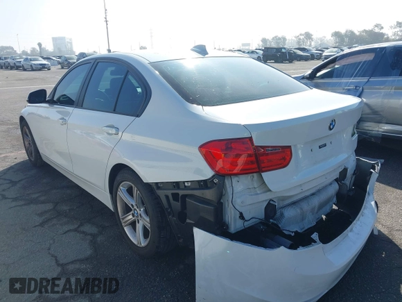 2014 BMW 3 Series 328i with VIN WBA3A5C52EJ463819, listed as a IAAI auction lot 41669717 with 111,112 mi miles. Bid and sale history available at carsss.com. Image 3.