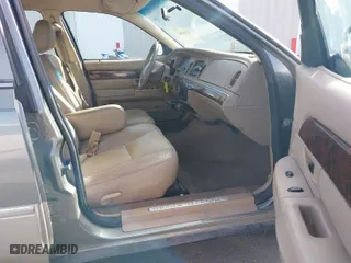 2004 Mercury Grand Marquis GS with VIN 2MEFM74W74X678515, listed as a IAAI auction lot 41916962 with 121,789 mi miles. Bid and sale history available at carsss.com. Image 5.