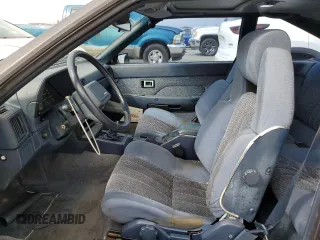 1985 Toyota Supra z VIN JT2MA67L3F0151708, wystawiony jako Copart lot #74672844 z przebiegiem 60 346 mil mil oraz Szkoda całkowita • Salvage title. Historia ofert i sprzedaży dostępna na DreamBid. Obrazek 7.