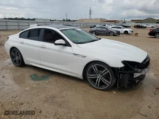 2018 BMW 6 Series 640i with VIN WBA6D0C52JG852877, listed as a Copart auction lot 63553794 with 0 mi miles and Salvage Title. Bid and sale history available at carsss.com. Image 4.