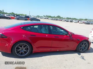 2022 Tesla Model S с VIN 5YJSA1E55NF491593, выставлен на аукционе IAAI как лот 42223771 с пробегом 58 875 миль миль и . История ставок и продаж доступна на DreamBid. Изображение 13.