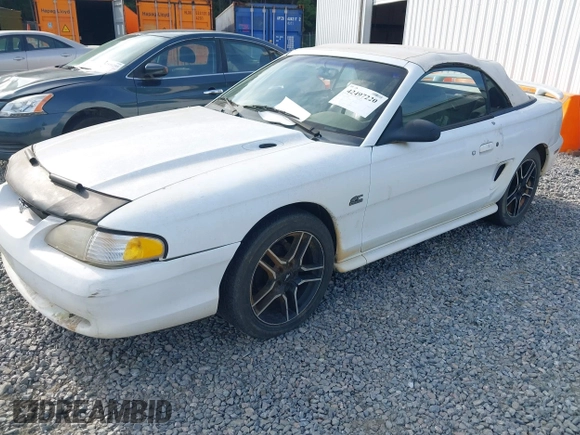 1994 Ford Mustang z VIN 1FALP45T2RF189589, wystawiony jako IAAI lot #42497220 z przebiegiem 98 565 mil mil oraz . Historia ofert i sprzedaży dostępna na DreamBid. Obrazek 2.