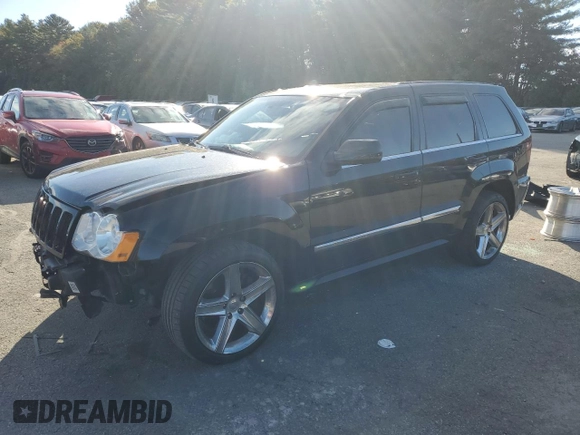 2008 Jeep Grand Cherokee SRT-8 with VIN 1J8HR78368C152318, listed as a Copart auction lot 74203604 with 157,840 mi miles and Salvage Title. Bid and sale history available at carsss.com. Image 1.