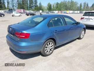 2015 Volkswagen Jetta Sedan 1.8T SE with VIN 3VWD17AJ1FM270114, listed as a IAAI auction lot 42128816 with 111,701 mi miles. Bid and sale history available at carsss.com. Image 4.