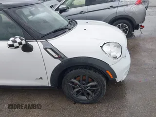 2013 MINI Countryman S ALL4 with VIN WMWZC5C50DWP30199, listed as a IAAI auction lot 42399104 with 103,367 mi miles and . Bid and sale history available at DreamBid. Image 12.