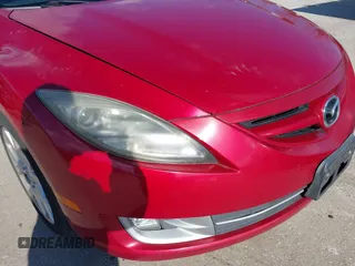 2009 Mazda 6 S Grand Touring with VIN 1YVHP82B495M13805, listed as a IAAI auction lot 41595504 with 156,432 mi miles and . Bid and sale history available at DreamBid. Image 6.