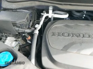 2022 Honda Pilot Touring 8-Passenger z VIN 5FNYF5H95NB017211, wystawiony jako IAAI lot #43010500 z przebiegiem 38 363 mil mil oraz . Historia ofert i sprzedaży dostępna na DreamBid. Obrazek 19.