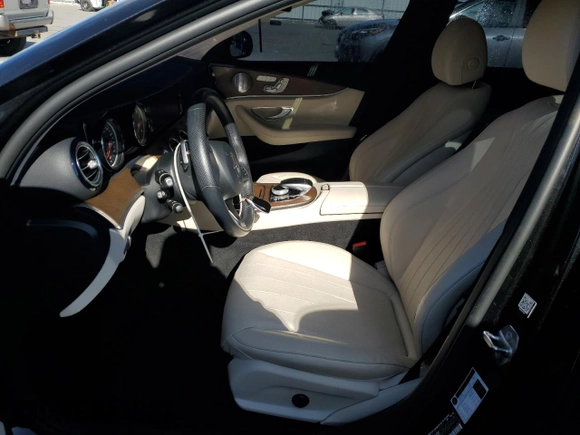 2018 Mercedes-Benz E 300 with VIN WDDZF4KBXJA464197, listed as a Copart auction lot 53205215 with 38,002 mi miles and Salvage title. Bid and sale history available at DreamBid. Image 7.