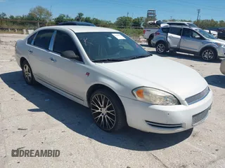 2013 Chevrolet Impala Police with VIN 2G1WD5E34D1227693, listed as a IAAI auction lot 41613853 with 163,891 mi miles. Bid and sale history available at carsss.com. Image 1.