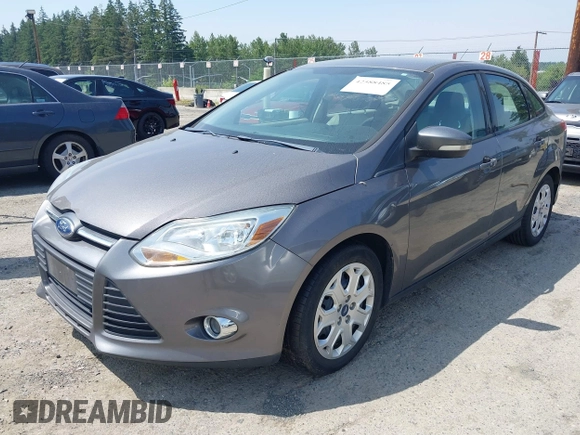 2012 Ford Focus SE with VIN 1FAHP3F25CL260962, listed as a IAAI auction lot 42588485 with 143,679 mi miles and . Bid and sale history available at DreamBid. Image 2.