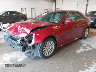 2012 Cadillac CTS Luxury with VIN 1G6DG5E5XC0122855, listed as a IAAI auction lot 41942360 with 246,820 mi miles and . Bid and sale history available at DreamBid. Image 2.