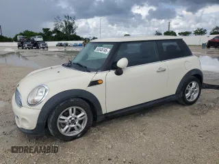 2013 MINI Hardtop with VIN WMWSU3C59DT682027, listed as a Copart auction lot 65048745 with 76,769 mi miles and Salvage title. Bid and sale history available at DreamBid. Image 1.