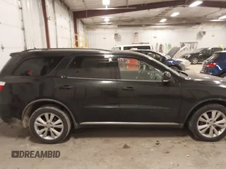 2012 Dodge Durango Crew with VIN 1C4SDJDT6CC205946, listed as a IAAI auction lot 41531175 with 211,372 mi miles and . Bid and sale history available at carsss.com. Image 13.