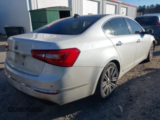 2015 Kia Cadenza Premium with VIN KNALN4D77F5170135, listed as a IAAI auction lot 41310337 with 237,376 mi miles. Bid and sale history available at carsss.com. Image 4.