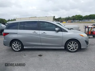 2013 Mazda 5 Touring with VIN JM1CW2CL5D0160104, listed as a IAAI auction lot 41722470 with 135,708 mi miles. Bid and sale history available at carsss.com. Image 13.