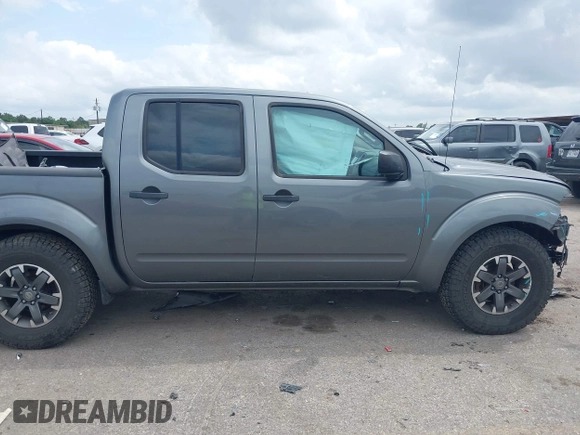 2016 Nissan Frontier SV z VIN 1N6AD0ER0GN763193, wystawiony jako IAAI lot #42137941 z przebiegiem 118 660 mil mil oraz . Historia ofert i sprzedaży dostępna na DreamBid. Obrazek 13.