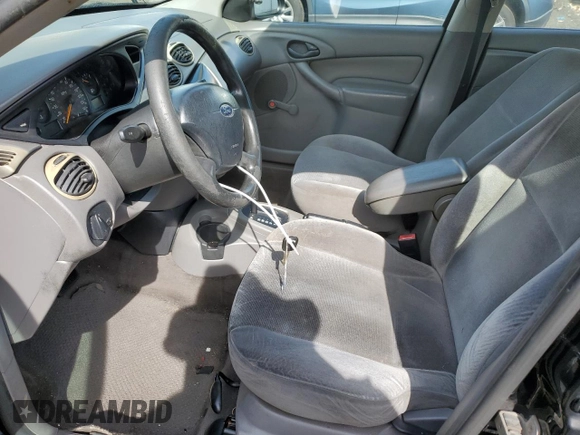 2002 Ford Focus LX with VIN 1FAFP33P72W239485, listed as a Copart auction lot 73323084 with 94,876 mi miles and Non Repairable. Bid and sale history available at DreamBid. Image 7.