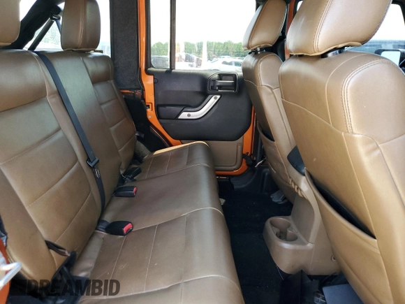 2011 Jeep Wrangler Unlimited Rubicon with VIN 1J4HA6H12BL584493, listed as a Copart auction lot 61765735 with 151,175 mi miles and Salvage title. Bid and sale history available at DreamBid. Image 10.