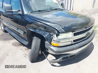 2003 Chevrolet Suburban LT z VIN 3GNGC26G83G210035, wystawiony jako IAAI lot #42084859 z przebiegiem 145 919 mil mil oraz . Historia ofert i sprzedaży dostępna na DreamBid. Obrazek 6.