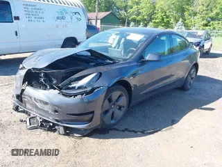 2023 Tesla Model 3 z VIN 5YJ3E1EA2PF492659, wystawiony jako IAAI lot #42284833 z przebiegiem 41 205 mil mil oraz . Historia ofert i sprzedaży dostępna na DreamBid. Obrazek 2.