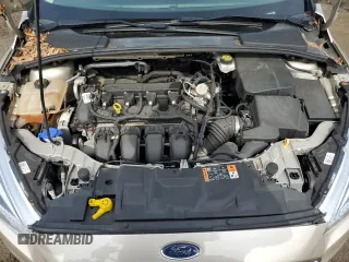2017 Ford Focus SE z VIN 1FADP3F24HL291870, wystawiony jako Copart lot #60851275 z przebiegiem 83 334 mil mil oraz Szkoda całkowita • Salvage title. Historia ofert i sprzedaży dostępna na DreamBid. Obrazek 11.