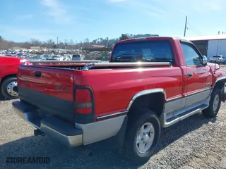 1997 Dodge Ram 1500 with VIN 1B7HF16Z4VJ599418, listed as a IAAI auction lot 41447646 with 168,652 mi miles. Bid and sale history available at carsss.com. Image 4.