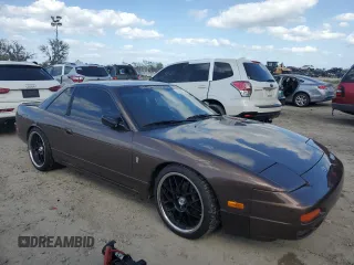 1991 Nissan 240SX z VIN JN1MS34PXMW001053, wystawiony jako Copart lot #79007744 z przebiegiem 172 425 mil mil oraz Nie do naprawy. Historia ofert i sprzedaży dostępna na DreamBid. Obrazek 4.