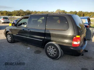 2005 Kia Sedona LX with VIN KNDUP131056640057, listed as a Copart auction lot 72153844 with 192,136 mi miles and Salvage Title. Bid and sale history available at carsss.com. Image 2.