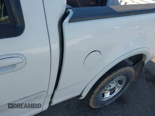 2003 Ford F-150 XLT with VIN 1FTRW08633KD11896, listed as a IAAI auction lot 42137360 with 118,654 mi miles. Bid and sale history available at carsss.com. Image 15.