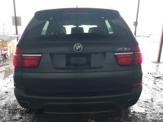 2011 BMW X5 50i with VIN 5UXZV8C59BL419527, listed as a IAAI auction lot 42173425 with 185,802 mi miles and . Bid and sale history available at DreamBid. Image 17.