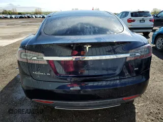 2014 Tesla Model S 60 z VIN 5YJSA1H10EFP35319, wystawiony jako Copart lot #53868745 z przebiegiem 209 424 mil mil oraz Szkoda całkowita • Salvage title. Historia ofert i sprzedaży dostępna na DreamBid. Obrazek 6.