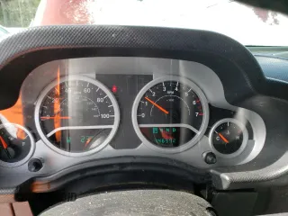 2009 Jeep Wrangler Sahara z VIN 1J4FA54159L789906, wystawiony jako Copart lot #45292375 z przebiegiem 146 992 mil mil oraz Szkoda całkowita • Salvage title. Historia ofert i sprzedaży dostępna na DreamBid. Obrazek 9.