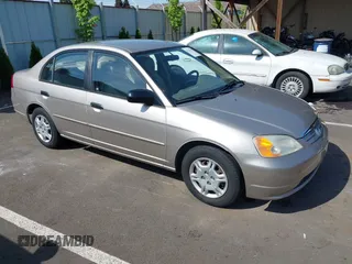 2001 Honda Civic LX with VIN 2HGES16541H509564, listed as a IAAI auction lot 42121423 with 129,561 mi miles. Bid and sale history available at carsss.com. Image 1.