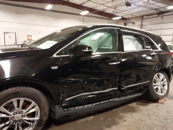2020 Cadillac XT5 Premium Luxury AWD with VIN 1GYKNDRS9LZ197122, listed as a IAAI auction lot 41743191 with 93,868 mi miles. Bid and sale history available at carsss.com. Image 6.