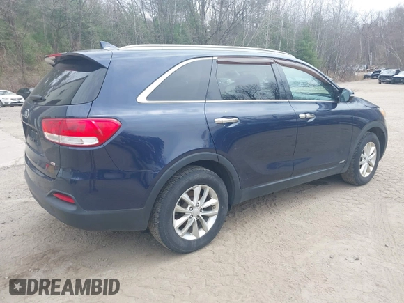 2016 Kia Sorento LX with VIN 5XYPGDA34GG054366, listed as a IAAI auction lot 42126008 with 218,148 mi miles. Bid and sale history available at carsss.com. Image 4.
