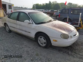 1997 Ford Taurus GL z VIN 1FALP52UXVA107778, wystawiony jako IAAI lot #42069491 z przebiegiem 57 736 mil mil oraz . Historia ofert i sprzedaży dostępna na DreamBid. Obrazek 1.