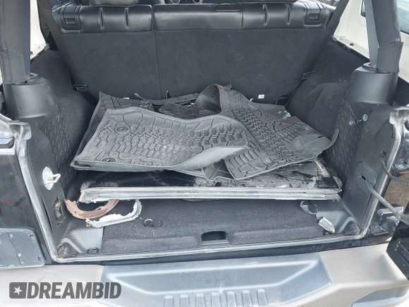 2017 Jeep Wrangler Unlimited Sahara with VIN 1C4BJWEGXHL520182, listed as a IAAI auction lot 42616692 with 88,169 mi miles and . Bid and sale history available at DreamBid. Image 18.