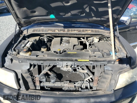 2004 Infiniti QX56 with VIN 5N3AA08C34N806460, listed as a Copart auction lot 80672124 with 193,607 mi miles and Clean Title. Bid and sale history available at carsss.com. Image 12.