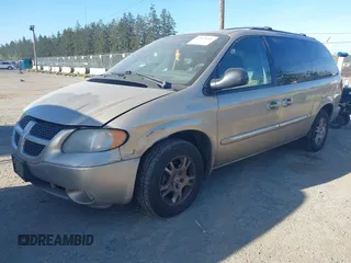 2002 Dodge Grand Caravan with VIN 2B8GT54L82R541812, listed as a IAAI auction lot 42028066 with 207,472 mi miles and . Bid and sale history available at DreamBid. Image 2.